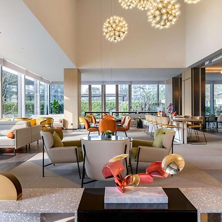 Hilton Garden Inn Shenzhen World Exhibition & Convention Center Экстерьер фото