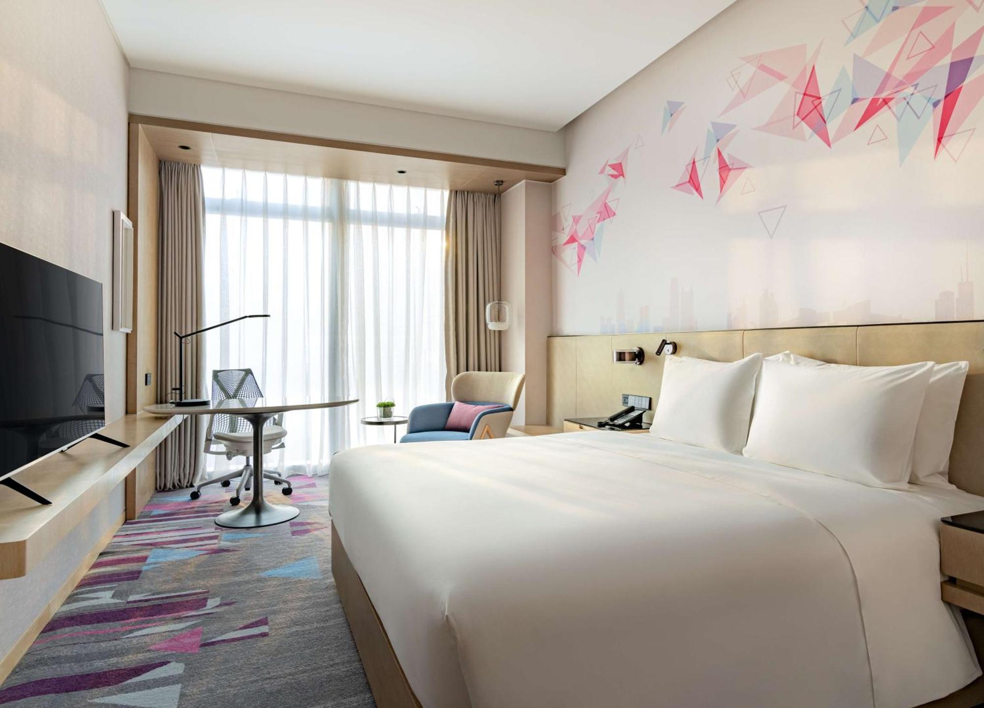 Hilton Garden Inn Shenzhen World Exhibition & Convention Center Экстерьер фото