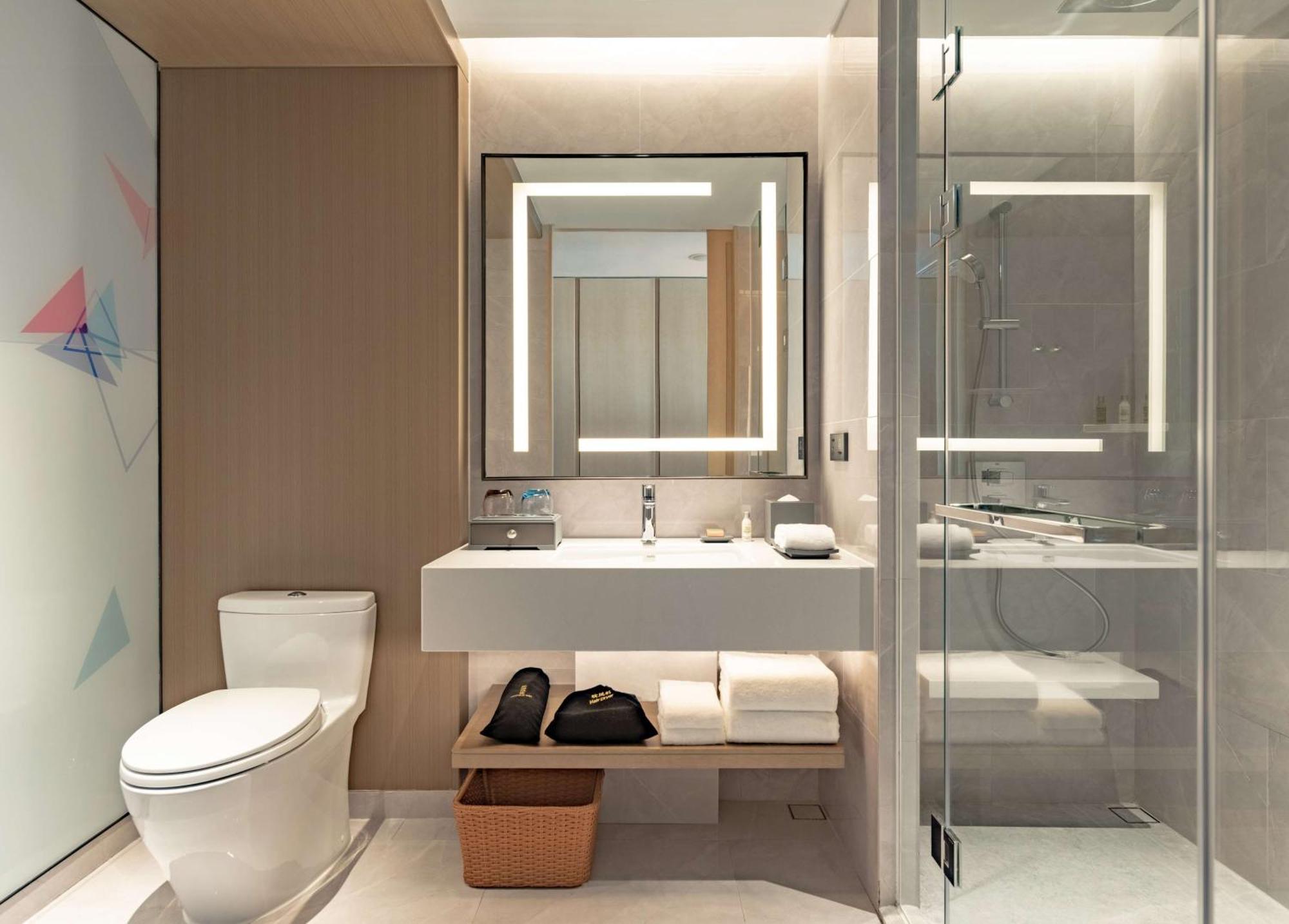 Hilton Garden Inn Shenzhen World Exhibition & Convention Center Экстерьер фото