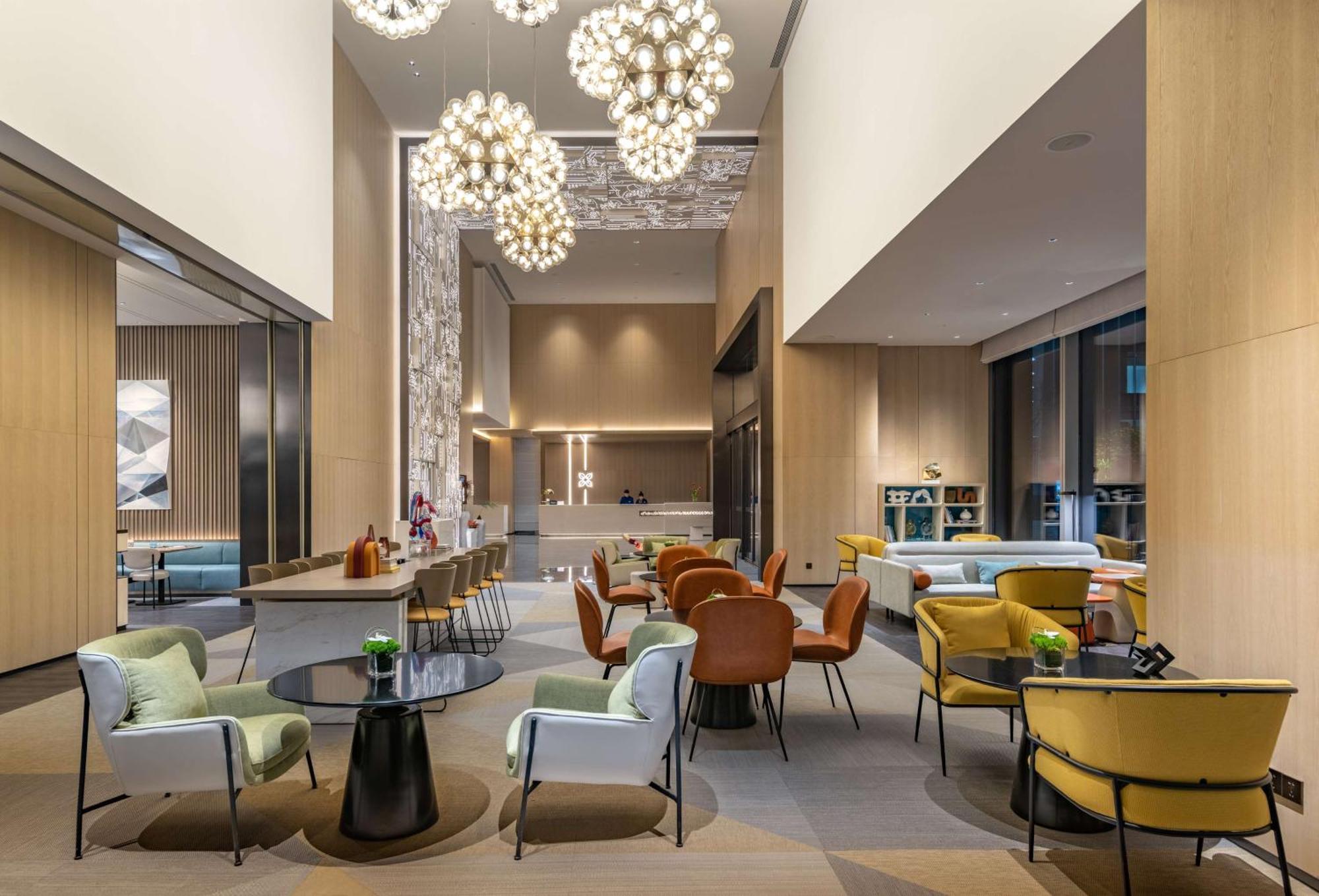 Hilton Garden Inn Shenzhen World Exhibition & Convention Center Экстерьер фото