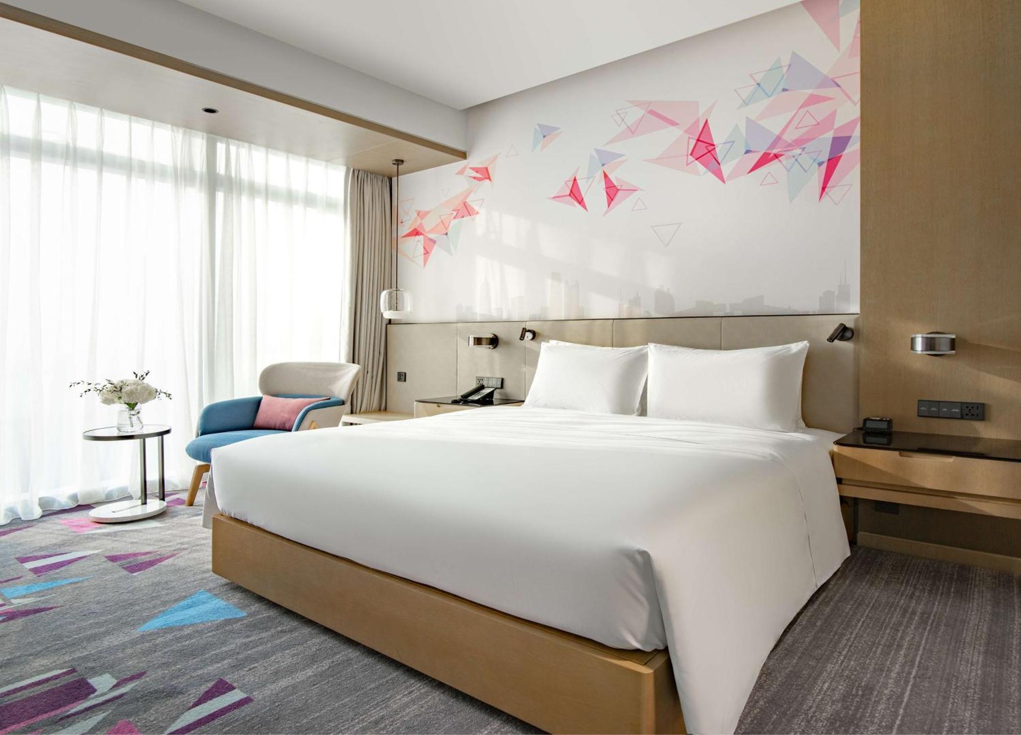 Hilton Garden Inn Shenzhen World Exhibition & Convention Center Экстерьер фото