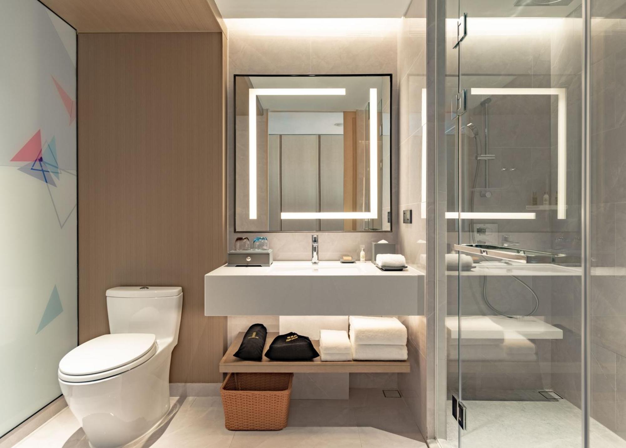 Hilton Garden Inn Shenzhen World Exhibition & Convention Center Экстерьер фото